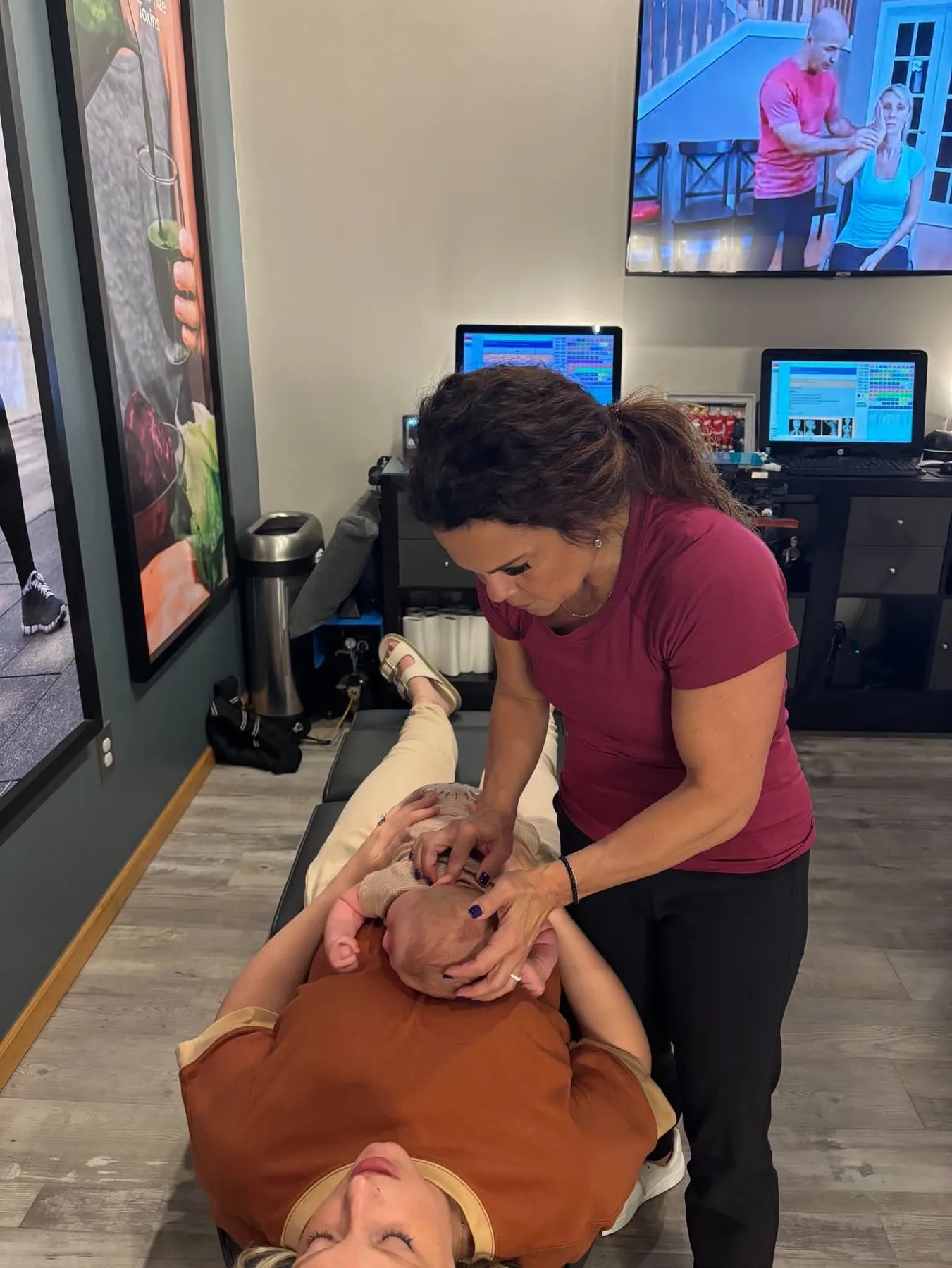 Dr. Sandie McCuiston providing wellness chiropractic care